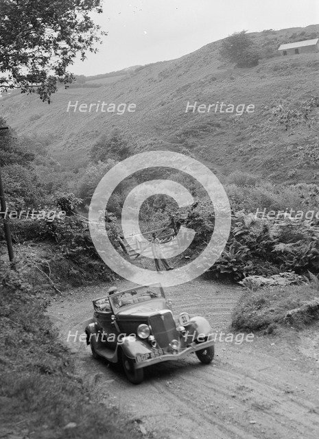 1934 Ford V8 tourer taking part in a motoring trial, late 1930s. Artist: Bill Brunell.