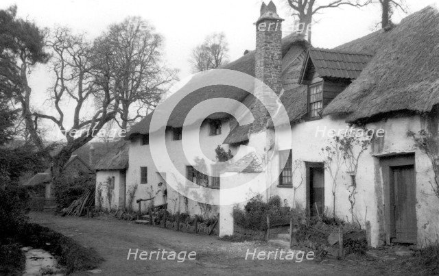 A pair of cottages with thatched roofs at Luccombe, Somerset, c1900.   Artist: Farnham Maxwell Lyte