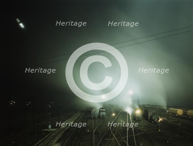 Night view of part of Santa Fe R.R. yard, Kansas City, Kansas, 1943. Creator: Jack Delano.
