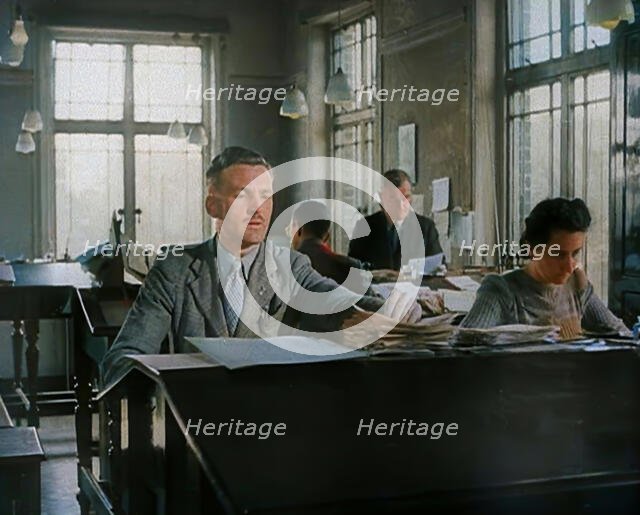 People Working in an Office, 1940. Creator: British Pathe Ltd.