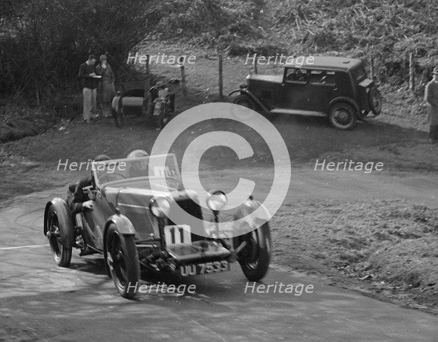 Aston Martin open sports competing in the JCC Half-Day Trial, 1930. Artist: Bill Brunell.