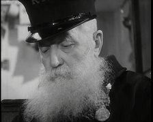 Close up on Male British Chelsea Pensioner with a Long White Beard, 1939. Creator: British Pathe Ltd.