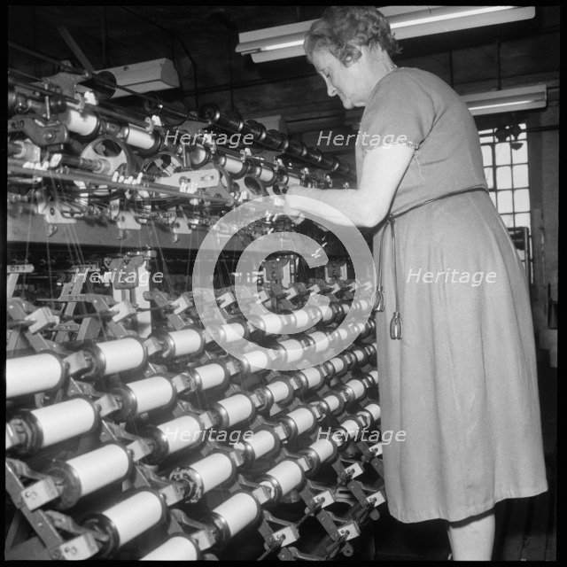 Woman worker, Wellington Mill, Strangman Street, Leek, Staffordshire, 1960-1974. Creator: Eileen Deste.
