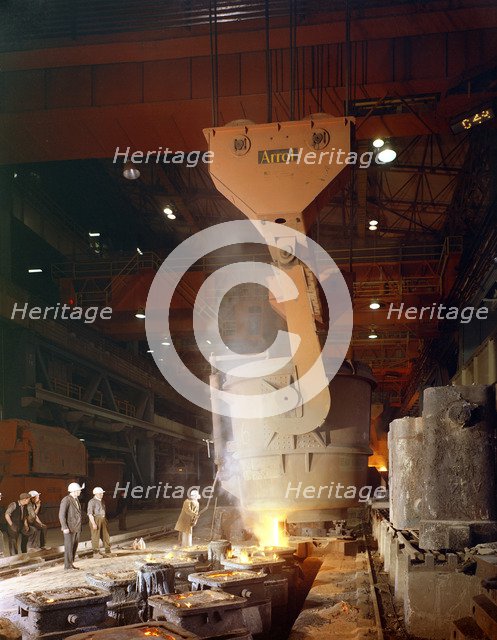 Teeming (pouring) steel ingots, Park Gate Iron and Steel Co, Rotherham, South Yorkshire, 1964. Artist: Michael Walters