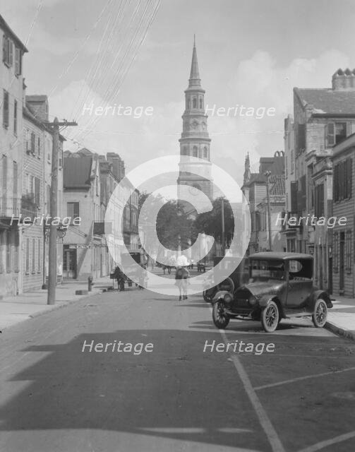 View down street to St. Philip's Church, Charleston, South Carolina, between 1920 and 1926. Creator: Arnold Genthe.