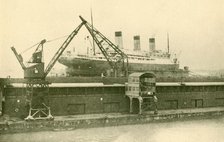 'Lifitng a "Majestic" (56,551 Tons) in the Floating Dock at Southampton', c1930. Creator: Unknown.