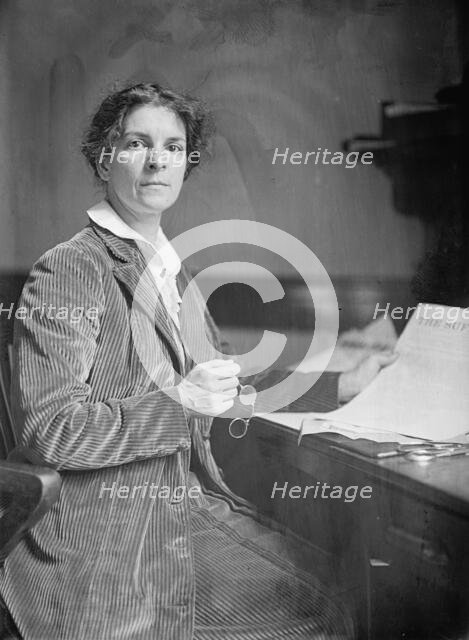 Mrs. Rheta C. Dorr, Suffragist, with First Edition of 'The Suffragist', 1913. Creator: Harris & Ewing.