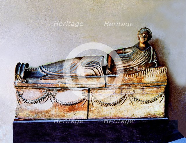Etruscan terracotta sarcophagus with the image of the deceased.