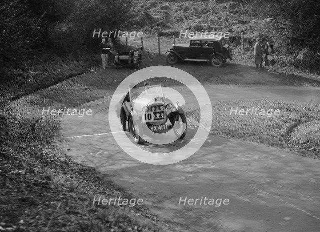 Austin 7 Gordon England Cup competing in the JCC Half-Day Trial, 1930. Artist: Bill Brunell.