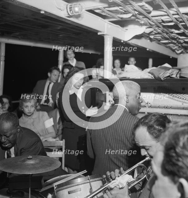 Portrait of Baby Dodds and Marty Marsala, Riverboat on the Hudson, N.Y., ca. July 1947. Creator: William Paul Gottlieb.