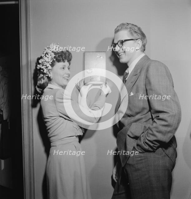 Portrait of Melvin G. Powell and Martha Scott in their home, Connecticut, ca. May 1947. Creator: William Paul Gottlieb.