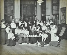 First aid class for women, Montem Street Evening Institute, London, 1913. Artist: Unknown.