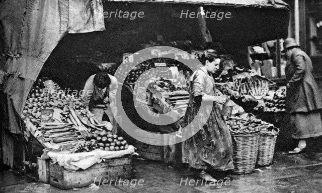 A greengrocer of the Commercial Road, London, 1926-1927. Artist: Unknown