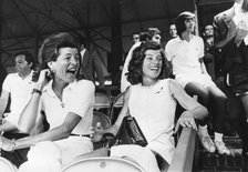 Patricia Kennedy Lawford and Eunice Kennedy Shriver enjoying a tennis tournament, c1960s. Artist: Unknown