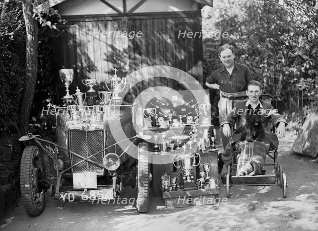 PS Flower with a MG J2 and motoring trophies, 1930s. Artist: Bill Brunell.