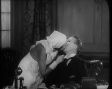 The Actors Sir Gerald Du Maurier and Benita Hulme Acting in a Play. They Kiss, 1931. Creator: British Pathe Ltd.