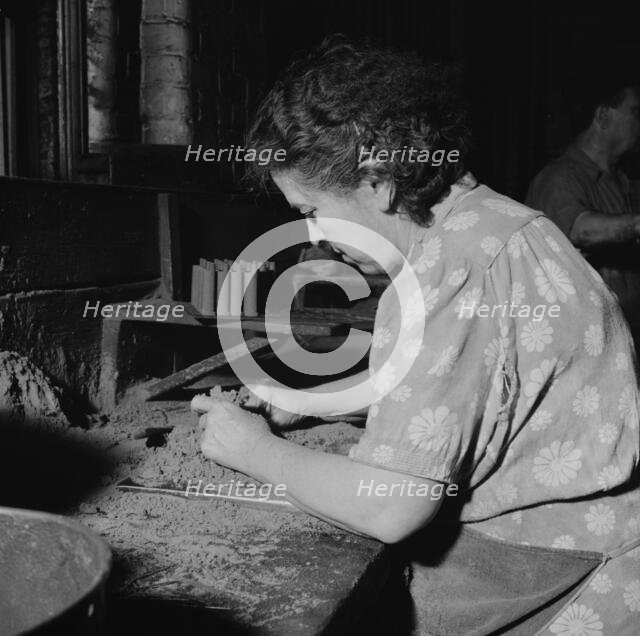Women employed at the Landers, Frary and Clark plant, New Britain, Connecticut, 1943. Creator: Gordon Parks.