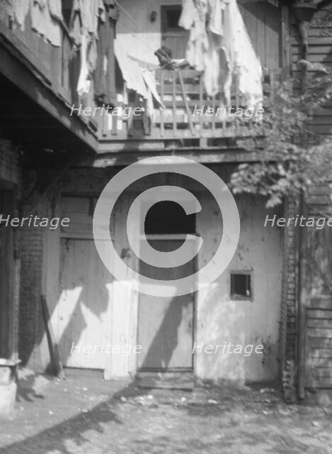 Courtyard, New Orleans, between 1920 and 1926. Creator: Arnold Genthe.