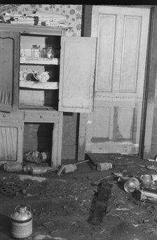 Interior of a farmhouse near Ridgeley, Tennessee, after the 1937 flood waters had subsided, 1937. Creator: Walker Evans.