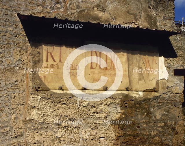 Roman graffiti on the wall, Road of Abundance, Pompeii, Italy, 2002. Creator: LTL.