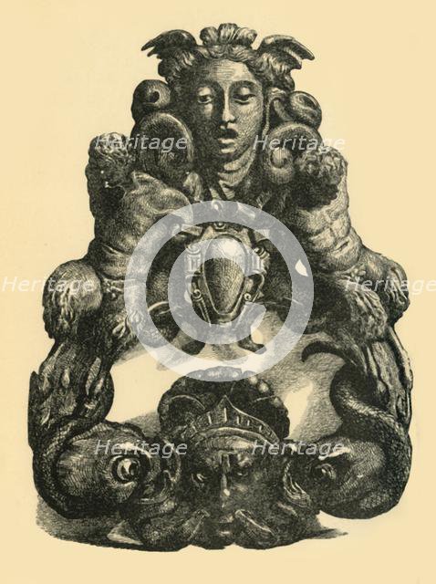 Door knocker with dolphins and satyrs, early 17th century, (1881). Creator: John Emms.