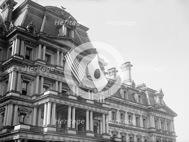 Flags - Japanese And United States Flags On State, War, And Navy Building; Japanese Mission, 1917. Creator: Harris & Ewing.