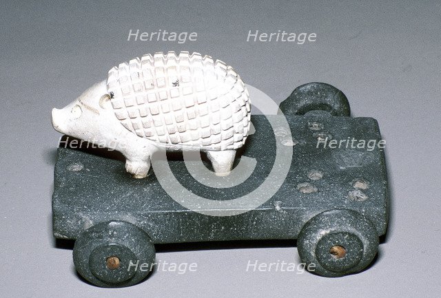 Calcite and bitumen hedgehog mounted on wheeled base, Susa, c12th century BC. Artist: Unknown