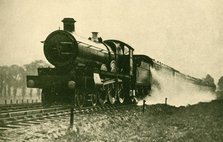 'Birmingham Express Picking Up Water at Ruislip, Great Western Railway', 1930. Creator: F. E Mackay.