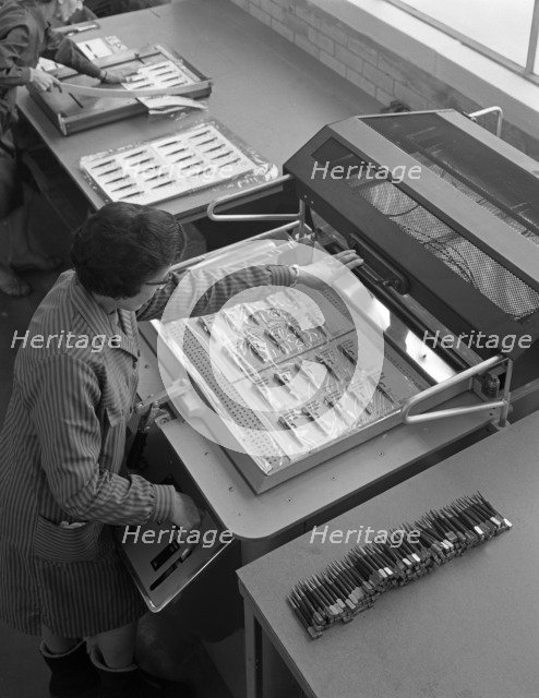 Packing punches, Footprint Tools, Sheffield, South Yorkshire, 1968.   Artist: Michael Walters