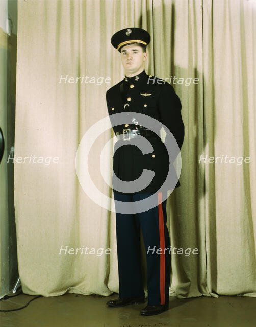 Marine Corps Captain in dress blue uniform, World War II, between 1941 and 1945. Creator: Howard Hollem.