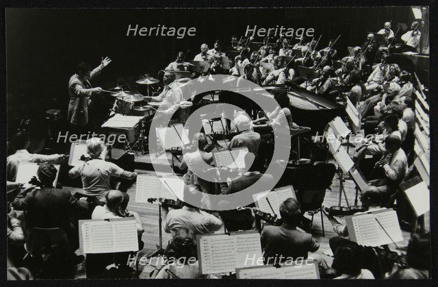 Buddy Rich and the Royal Philharmonic Orchestra in concert at the Royal Festival Hall, London, 1985. Artist: Denis Williams