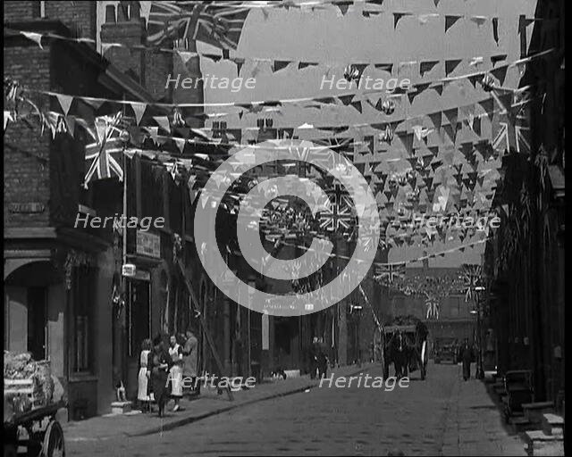 A Street is Decorated With Bunting For the Coronation of George VI, 1937. Creator: British Pathe Ltd.