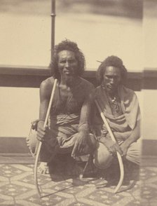 Portrait of Two Native Men Sitting on a Boat Holding Long Curved Sticks, 1865. Creator: Théodule Deveria.