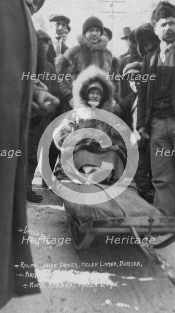 Ralph and Helen Lomen on dog sled, ready for race, 1915. Creator: Lomen Brothers.
