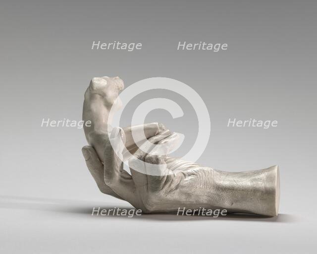 Hand of Rodin with a Female Figure, 1917. Creator: Auguste Rodin.