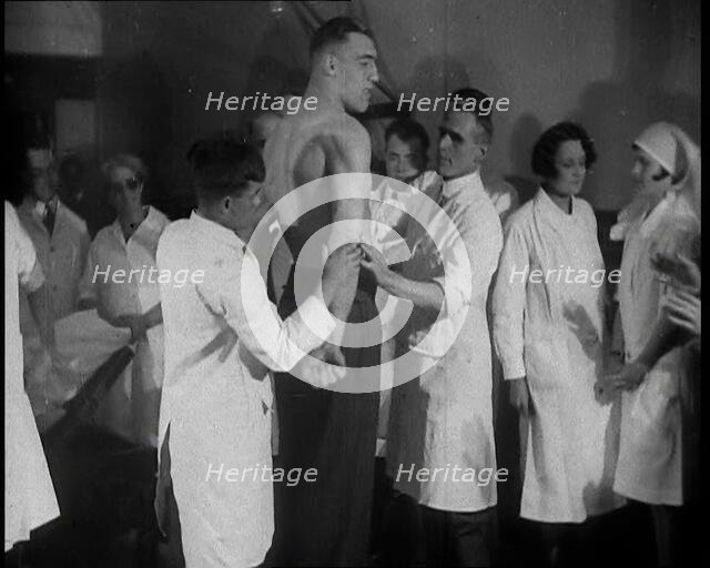 Doctors Checking the Physique of Primo Carnera, 1930s. Creator: British Pathe Ltd.