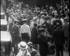 American Civilians Walking down the Streets of New York City, 1930. Creator: British Pathe Ltd.