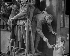 Male Soldier Shaking Hands with Female Civilian, 1929. Creator: British Pathe Ltd.