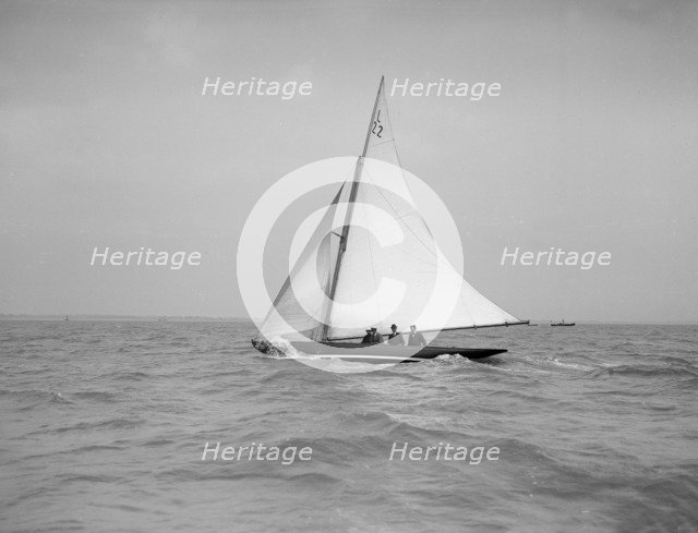 Outing on a 6 Metre sailing yacht (L22), 1912. Creator: Kirk & Sons of Cowes.