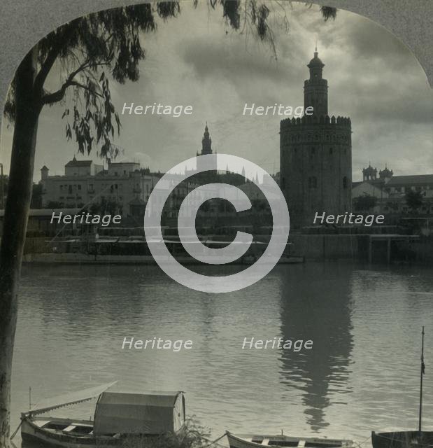 'The Tower of Gold and the Cathedral from across the Guadalquivir River, Seville, Spain', c1930s. Creator: Unknown.