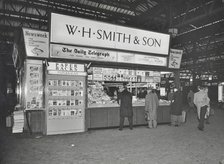 WH Smith's bookstall at Waterloo Station, Lambeth, London, 1960. Artist: Unknown.