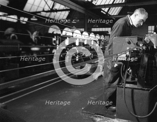 Bandsaws being sharpened at Slack Sellars & Co, Sheffield, South Yorkshire, 1963. Artist: Michael Walters