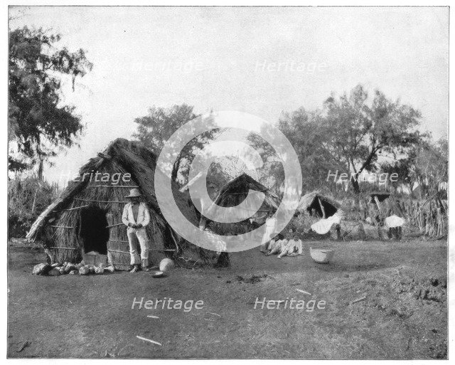 Straw cottages, Salamanca, Mexico, late 19th century.Artist: John L Stoddard