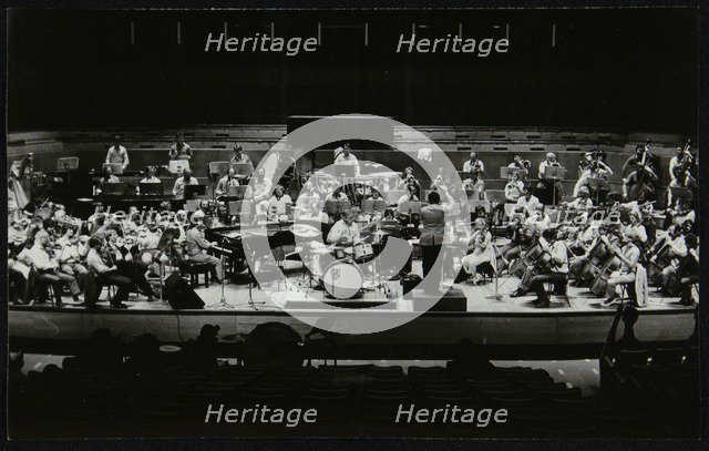 Buddy Rich and the Royal Philharmonic Orchestra in concert at the Royal Festival Hall, London, 1985. Artist: Denis Williams