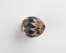 Bead, egg-shaped, with chamfered sides. Two sides chipped away, 13th-14th centuries. Creator: Unknown.
