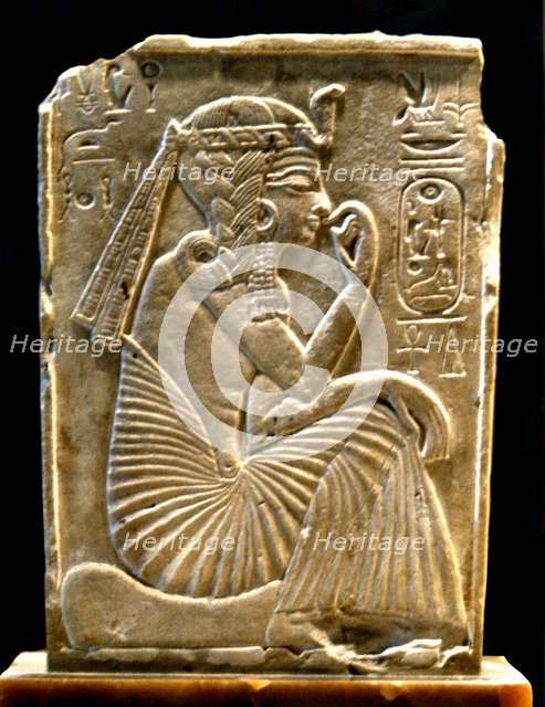 Ramses II represented sat and as a child, stela made of limestone.