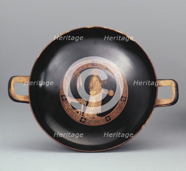 Kylix. A Woman with a Mirror. Attic pottery.