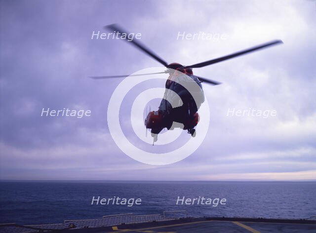Helicopter on an aircraft carrier, Falklands War, 1982. Creator: Luis Rosendo.