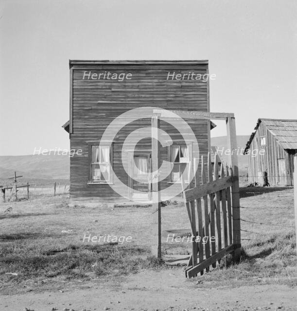 Farmer saloon and stagecoach tavern...the Ola self help sawmill co-op, Gem County, Idaho, 1939. Creator: Dorothea Lange.