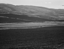 Newly-plowed fields on land...member of Ola self-help sawmill co-op, Gem County, Idaho, 1939. Creator: Dorothea Lange.
